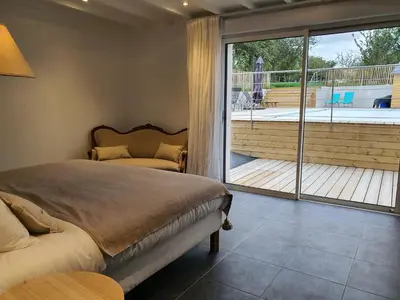 Un ou plusieurs lits dans un hébergement de l'établissement Au jardin de Capucine