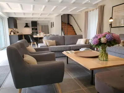 Coin salon dans l'établissement Au jardin de Capucine
