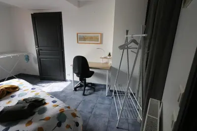 Un ou plusieurs lits dans un hébergement de l'établissement Maison avec terrasses à 300m de la mer Juno Beach