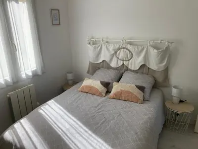 Un ou plusieurs lits dans un hébergement de l'établissement Maison familiale dans une rue paisible