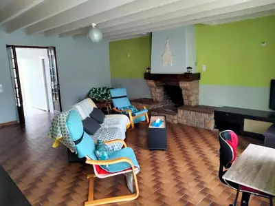 Coin salon dans l'établissement Maison MANTA