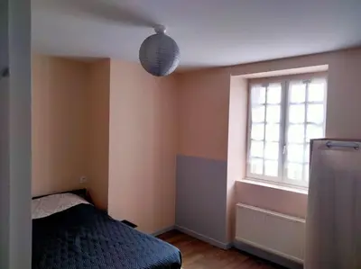Un ou plusieurs lits dans un hébergement de l'établissement Maison MANTA
