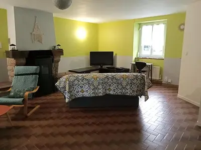 Télévision ou salle de divertissement dans l'établissement Maison MANTA