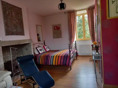 Un ou plusieurs lits dans un hébergement de l'établissement Le Petit Manoir