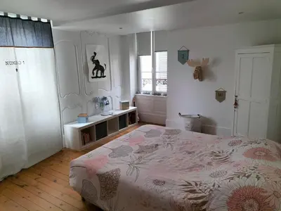 Un ou plusieurs lits dans un hébergement de l'établissement La chambre des Remparts