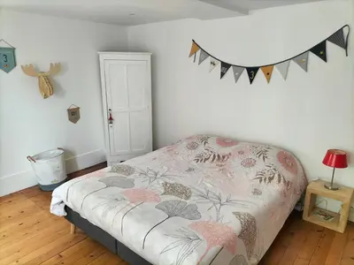 Un ou plusieurs lits dans un hébergement de l'établissement La chambre des Remparts