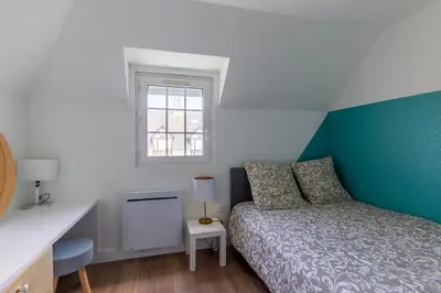Un ou plusieurs lits dans un hébergement de l'établissement Azul - Maison avec jardin à 200m de la plage