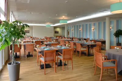 Restaurant ou autre lieu de restauration dans l'établissement Domitys La Plage de Nacre