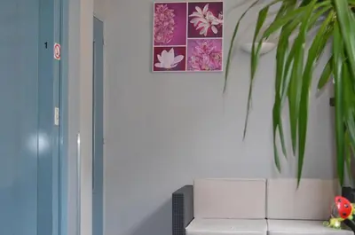 Coin salon dans l'établissement Hôtel de La Croix de Malte