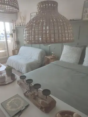 Un ou plusieurs lits dans un hébergement de l'établissement Appartement liberty