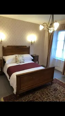 Un ou plusieurs lits dans un hébergement de l'établissement BnB@23