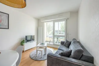 Coin salon dans l'établissement L'Ancre Marine - Appt à 100m de la plage