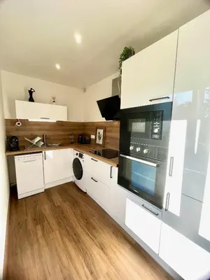 Cuisine ou kitchenette dans l'établissement Charmant studio + parking privé