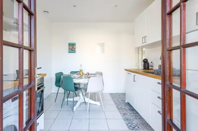 Cuisine ou kitchenette dans l'établissement La Maison Cabourgeaise proche mer