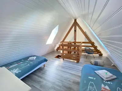 Un ou plusieurs lits dans un hébergement de l'établissement Holiday Home in Carteret near Dunes & Beach
