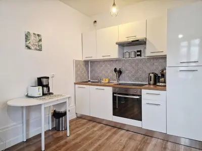Cuisine ou kitchenette dans l'établissement Frégate