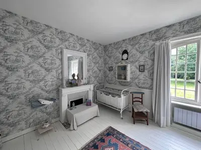 Un ou plusieurs lits dans un hébergement de l'établissement Manoir Charme Baie Mont St Michel