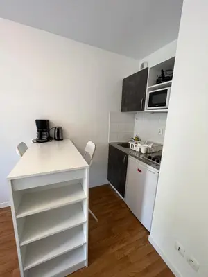 Cuisine ou kitchenette dans l'établissement Acajou, Studio avec terrasse et parking privé