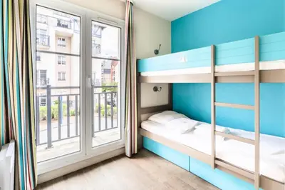 Un ou plusieurs lits dans un hébergement de l'établissement Résidence Port Guillaume - maeva Home - Maison 3 pièces 6 personnes - Budget MAE-5714