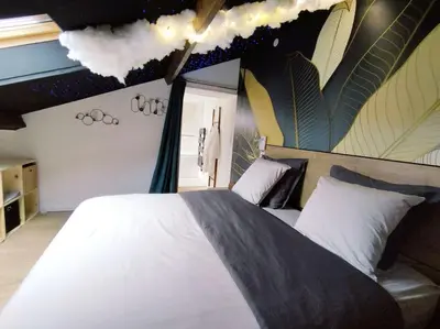 Un ou plusieurs lits dans un hébergement de l'établissement Bulles et belle étoile SPA proche de Caen