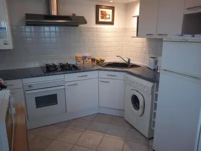 Cuisine ou kitchenette dans l'établissement confortable appartement duplex