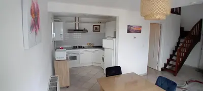 Cuisine ou kitchenette dans l'établissement confortable appartement duplex