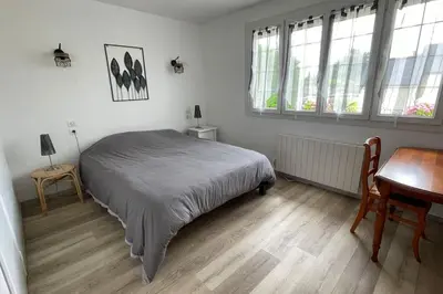 Un ou plusieurs lits dans un hébergement de l'établissement Maison vue mer Omaha Beach