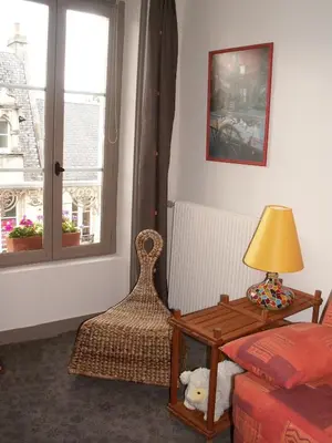Un ou plusieurs lits dans un hébergement de l'établissement Dodo et tartines B&B