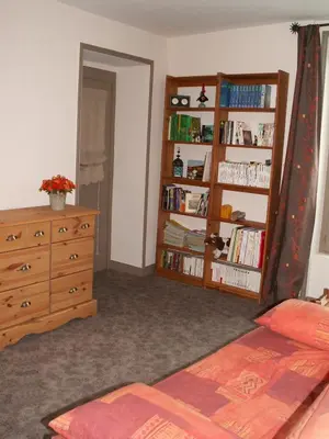 Un ou plusieurs lits dans un hébergement de l'établissement Dodo et tartines B&B