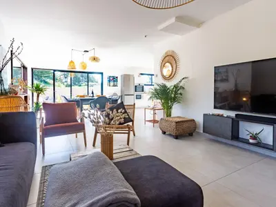 Télévision ou salle de divertissement dans l'établissement Holiday Home La Dune by Interhome