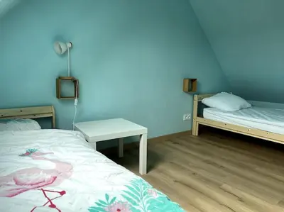 Un ou plusieurs lits dans un hébergement de l'établissement Maison à 3 min de Cabourg / 5min à pieds de la mer