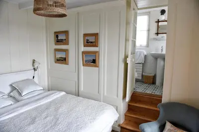 Un ou plusieurs lits dans un hébergement de l'établissement Maison Henri Chardon