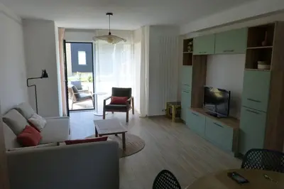 Télévision ou salle de divertissement dans l'établissement Cancoon - location appartement de vacances Cancale