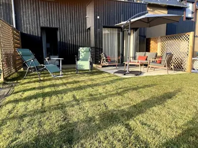 Jardin de l'établissement Cancoon - location appartement de vacances Cancale
