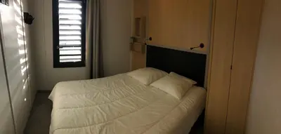 Un ou plusieurs lits dans un hébergement de l'établissement Cottage Jullouville récent l'Edune résidence vacances - plage 150 m -piscine - Wifi