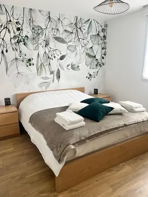 Un ou plusieurs lits dans un hébergement de l'établissement Maison 4/6 personnes à Bayeux