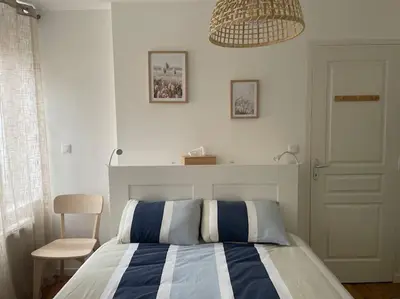 Un ou plusieurs lits dans un hébergement de l'établissement Maison de ville avec parking - Caen centre