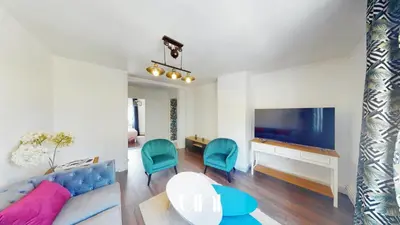 Télévision ou salle de divertissement dans l'établissement Appartement cosy d'Auge