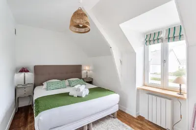 Un ou plusieurs lits dans un hébergement de l'établissement La maison d'Amélie Cancale