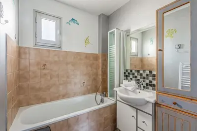 Salle de bains dans l'établissement Appartement Paroco - Welkeys
