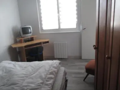 Télévision ou salle de divertissement dans l'établissement MAISON A LA MER