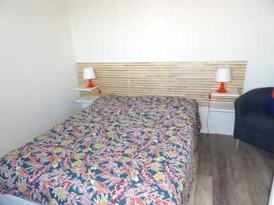 Un ou plusieurs lits dans un hébergement de l'établissement Charmant T2 tout confort Cabourg