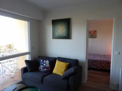 Coin salon dans l'établissement Charmant T2 tout confort Cabourg