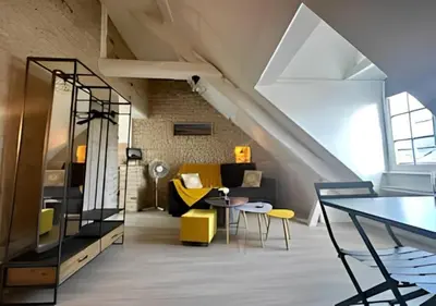 Coin salon dans l'établissement Studio au centre historique de Bayeux