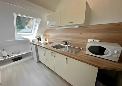 Cuisine ou kitchenette dans l'établissement Studio au centre historique de Bayeux
