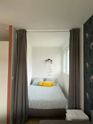 Un ou plusieurs lits dans un hébergement de l'établissement Appartement BIENVENUE