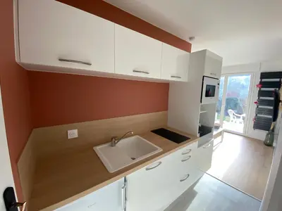 Cuisine ou kitchenette dans l'établissement Appartement BIENVENUE