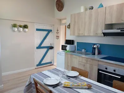 Cuisine ou kitchenette dans l'établissement Maison de pécheur a Barfleur