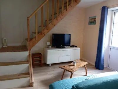 Télévision ou salle de divertissement dans l'établissement GITE A BARFLEUR