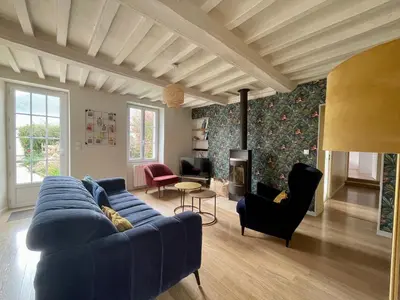 Coin salon dans l'établissement La maison des Declos avec parking privé